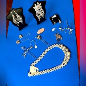 Lot of costume jewelry and hair accessories. Lot number 75.